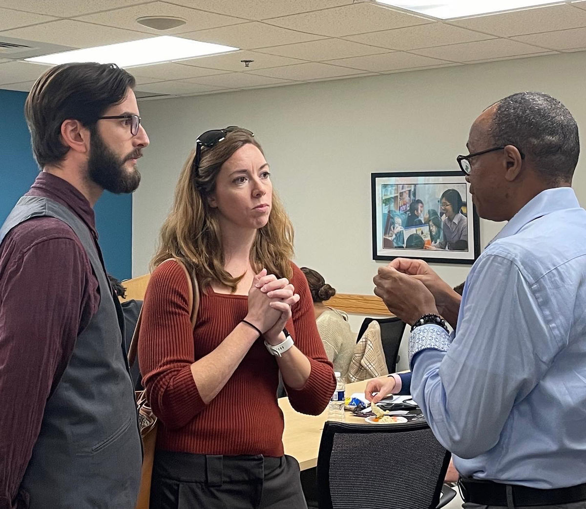 Interim Dean James Earl Davis engages with graduate students