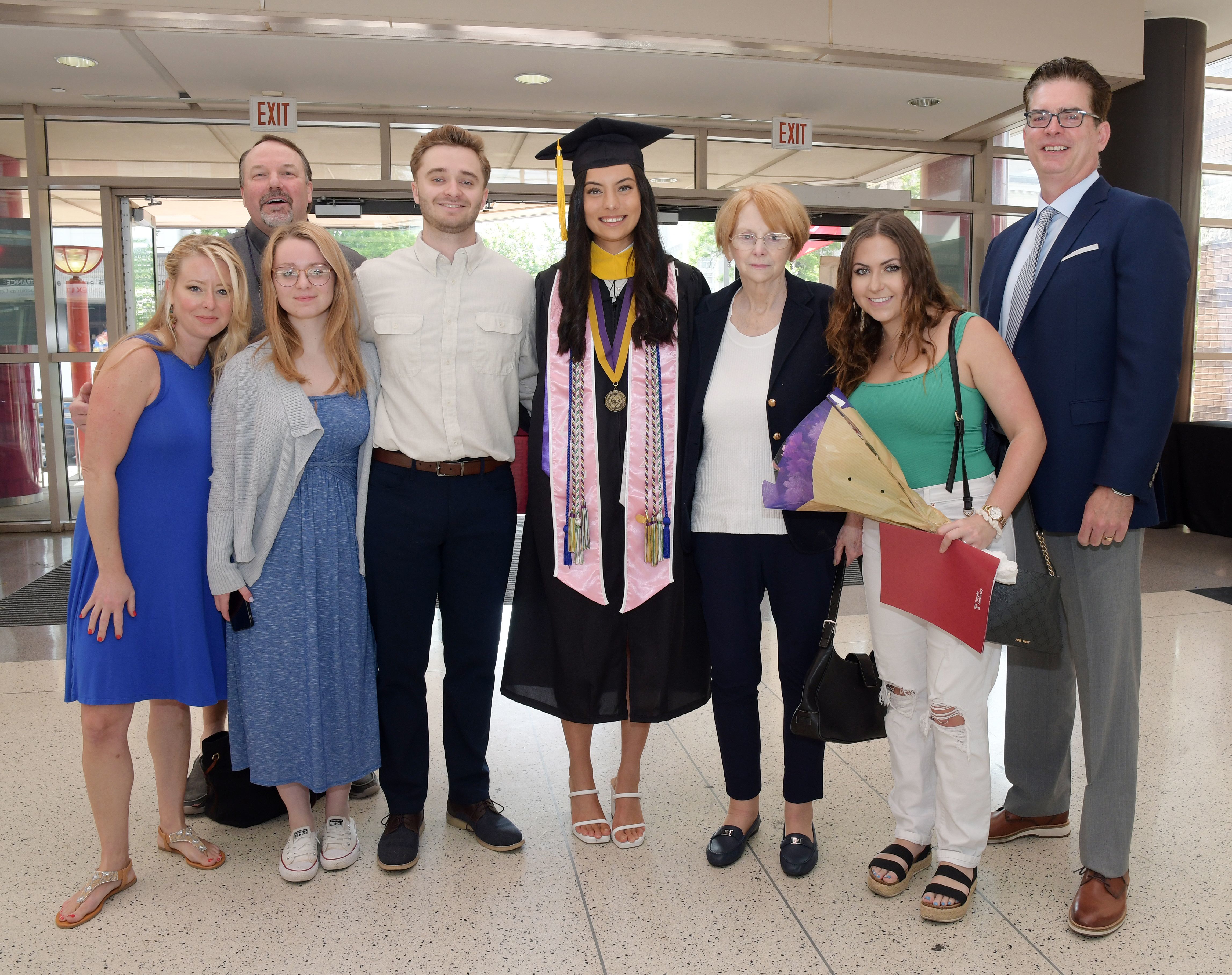 Undergraduate student speaker with her family