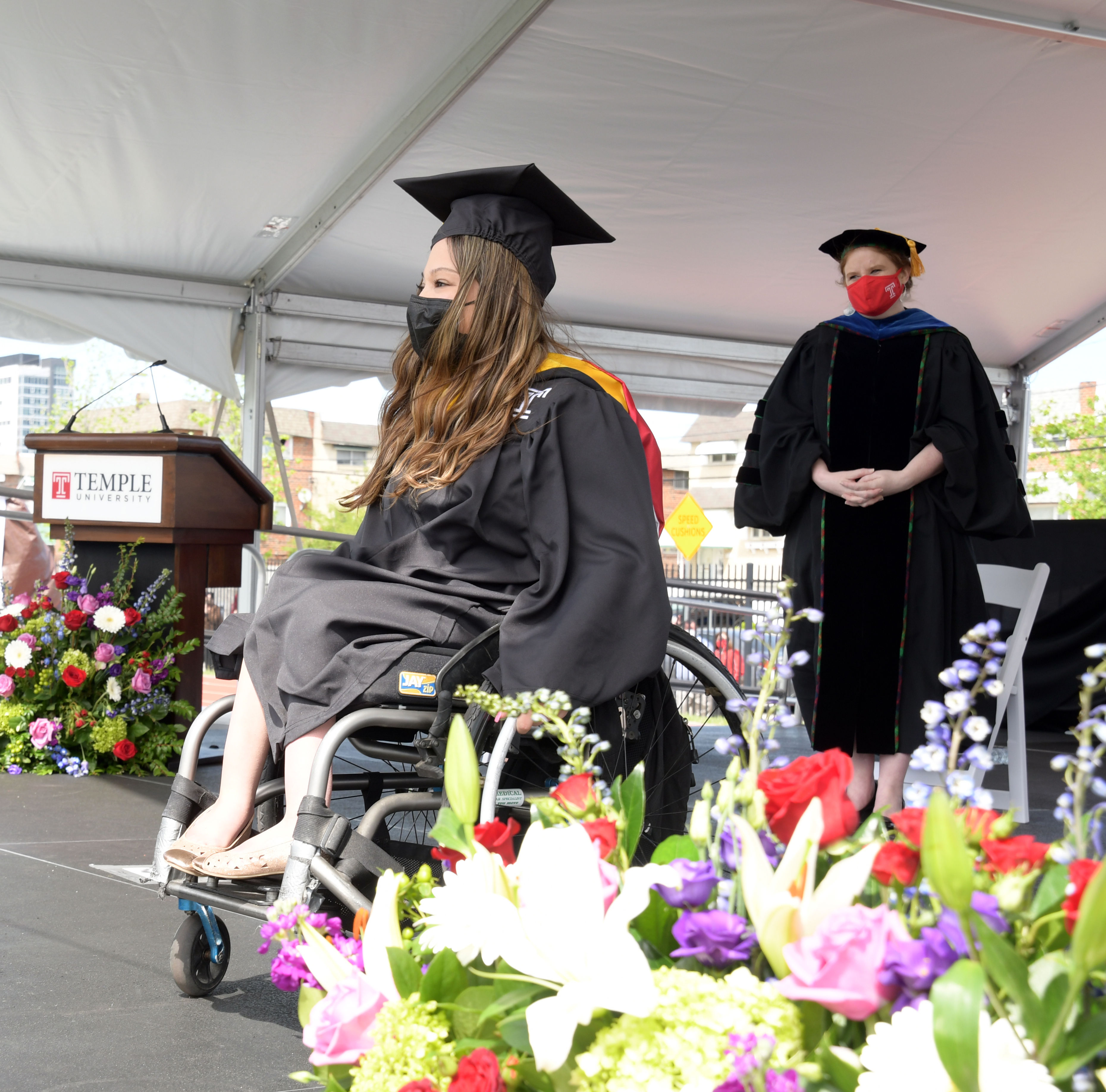 graduate is honored on stage