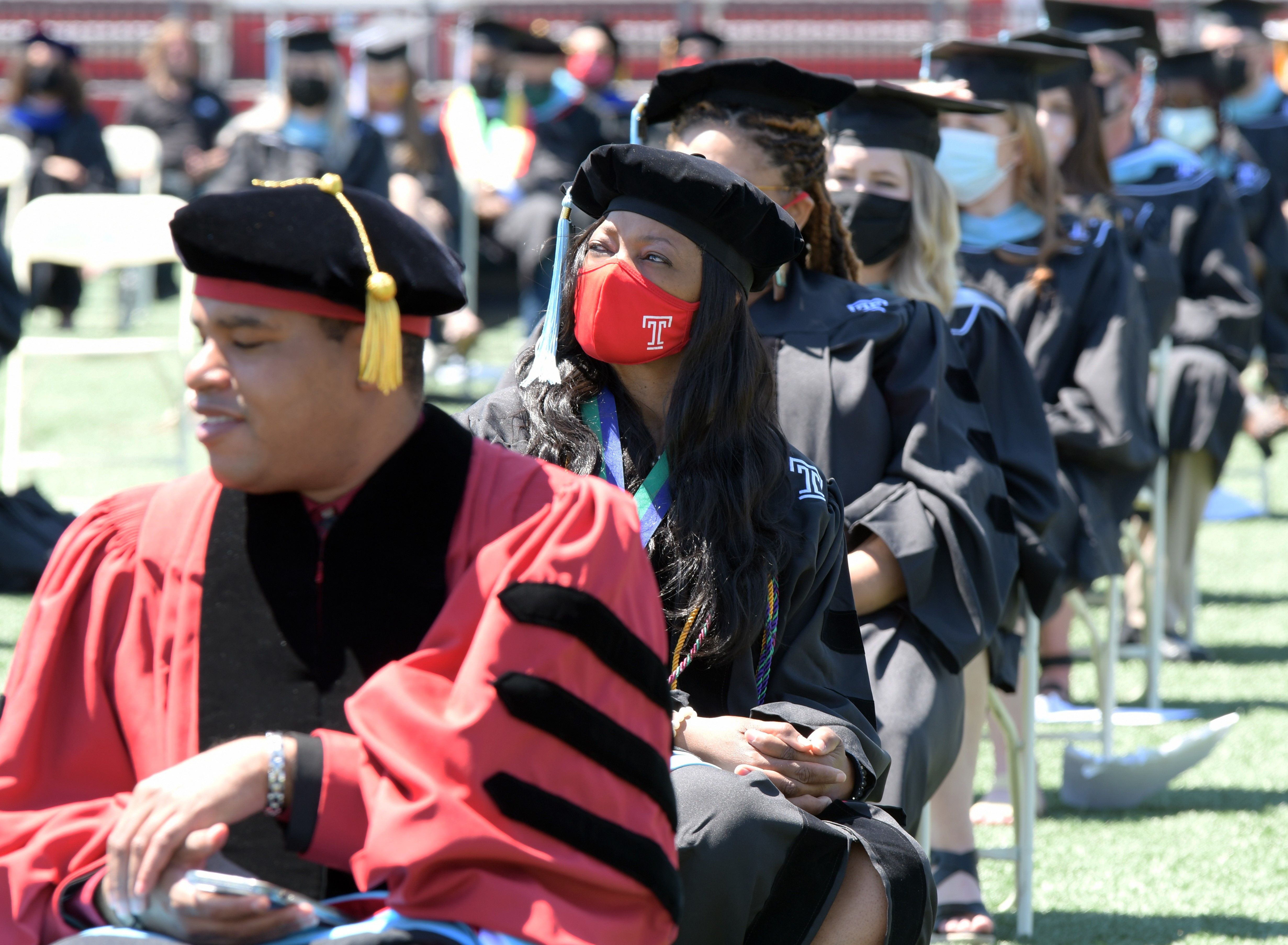 graduates sit during ceremony