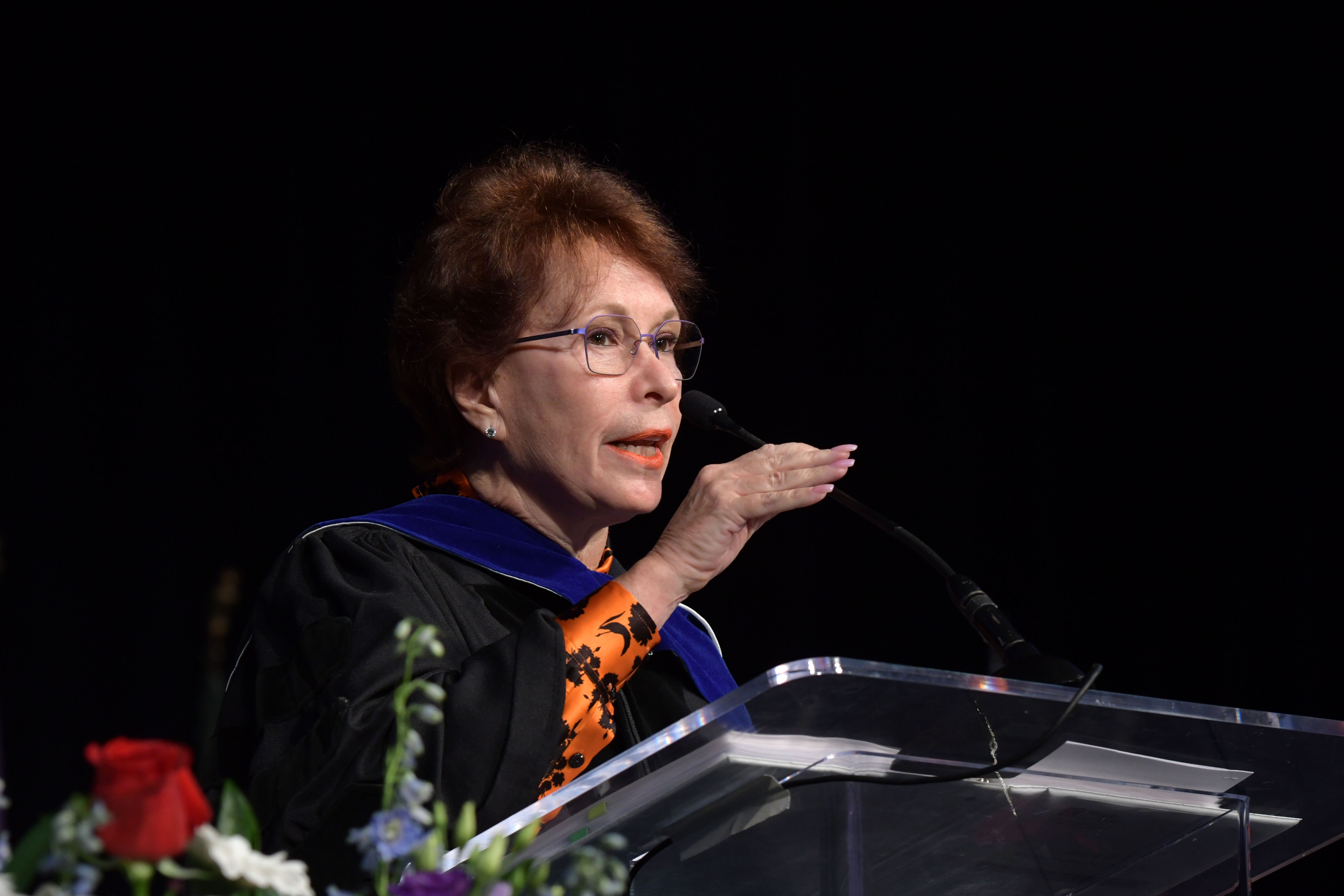 graduation speaker at podium