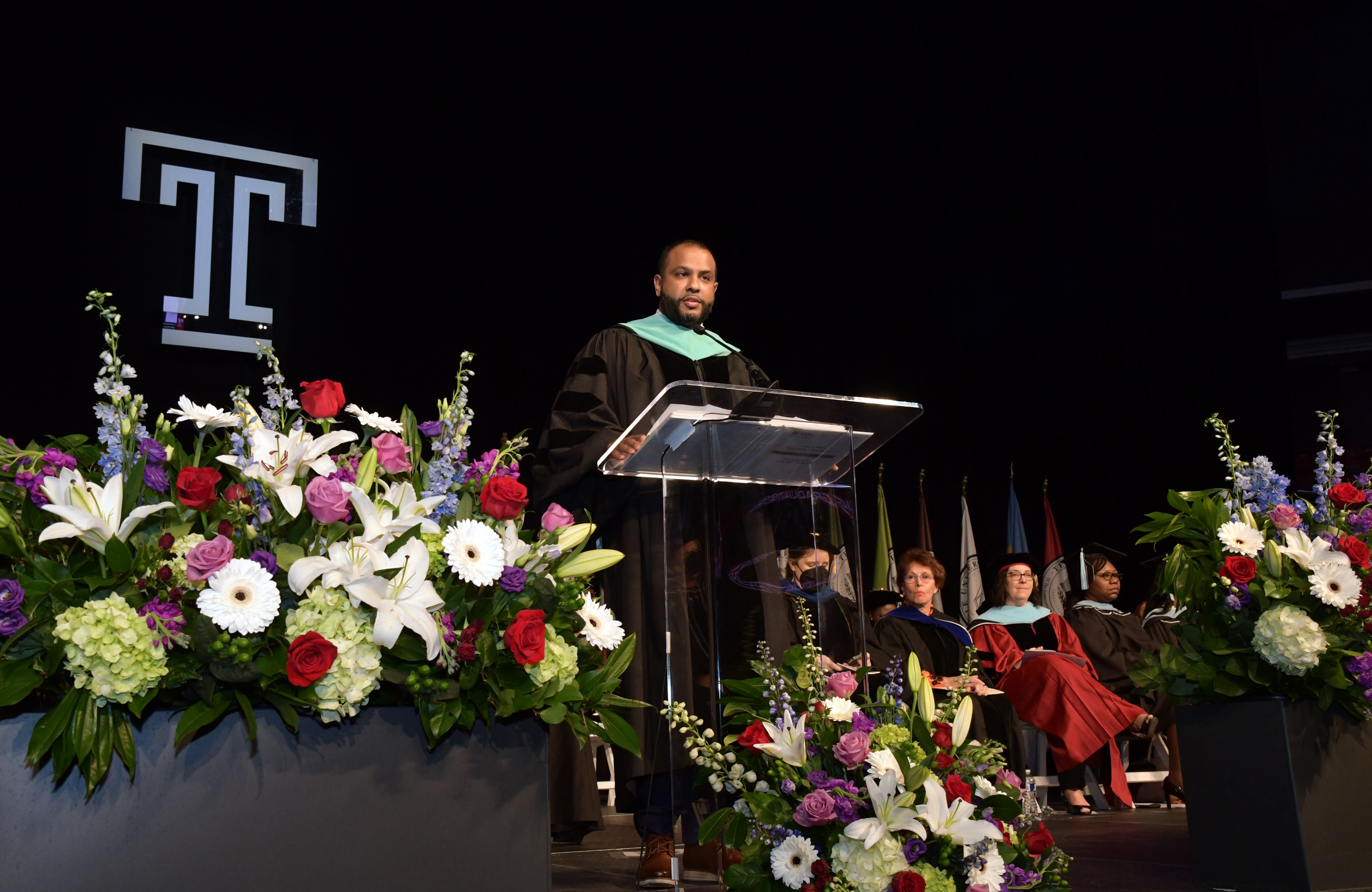 graduation speaker at podium