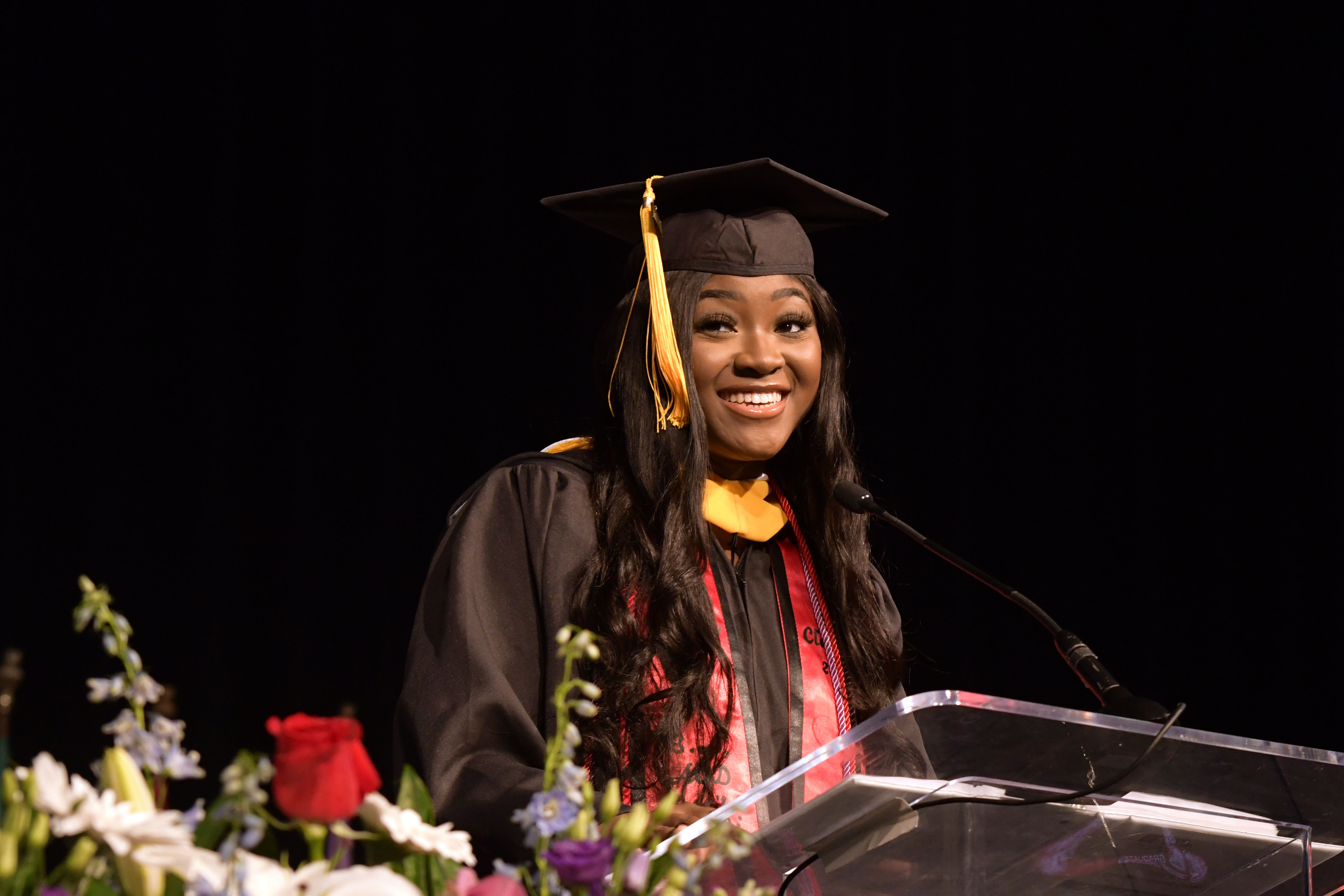 graduation speaker at podium