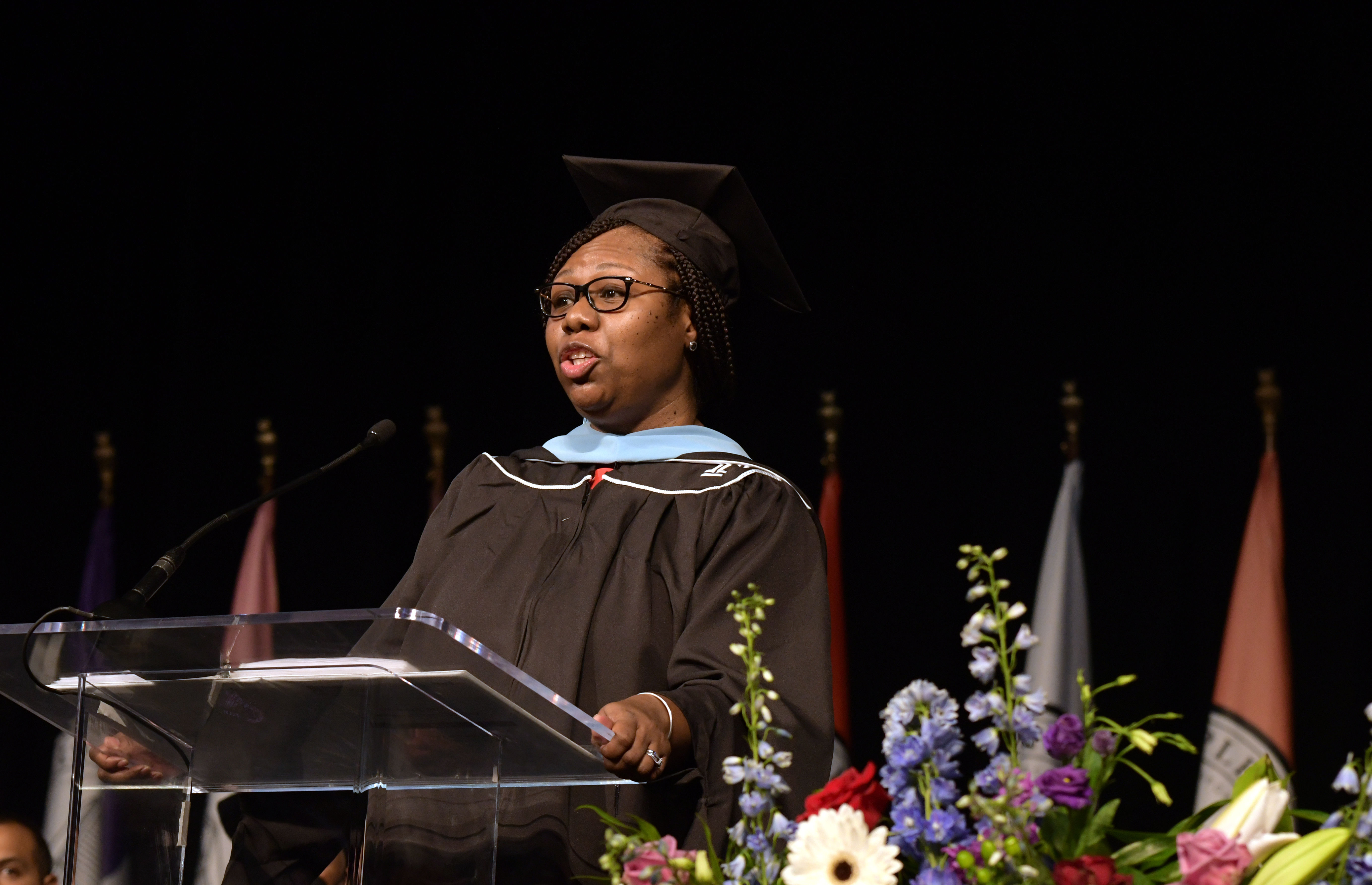 graduation speaker at podium