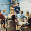 Teacher in front of a classroom of children