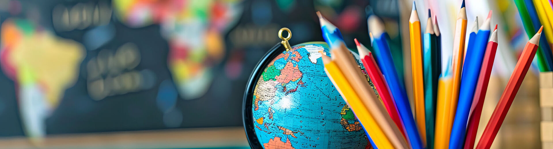 classroom with globe and map of the world