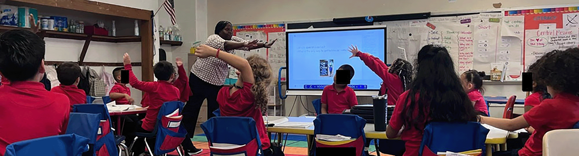 Teacher delivering a lesson to their class
