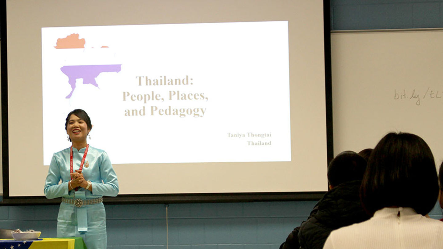 Taniya Thongtai, a teacher-participant from Thailand, presents during a culture share session. teacher participant presenting