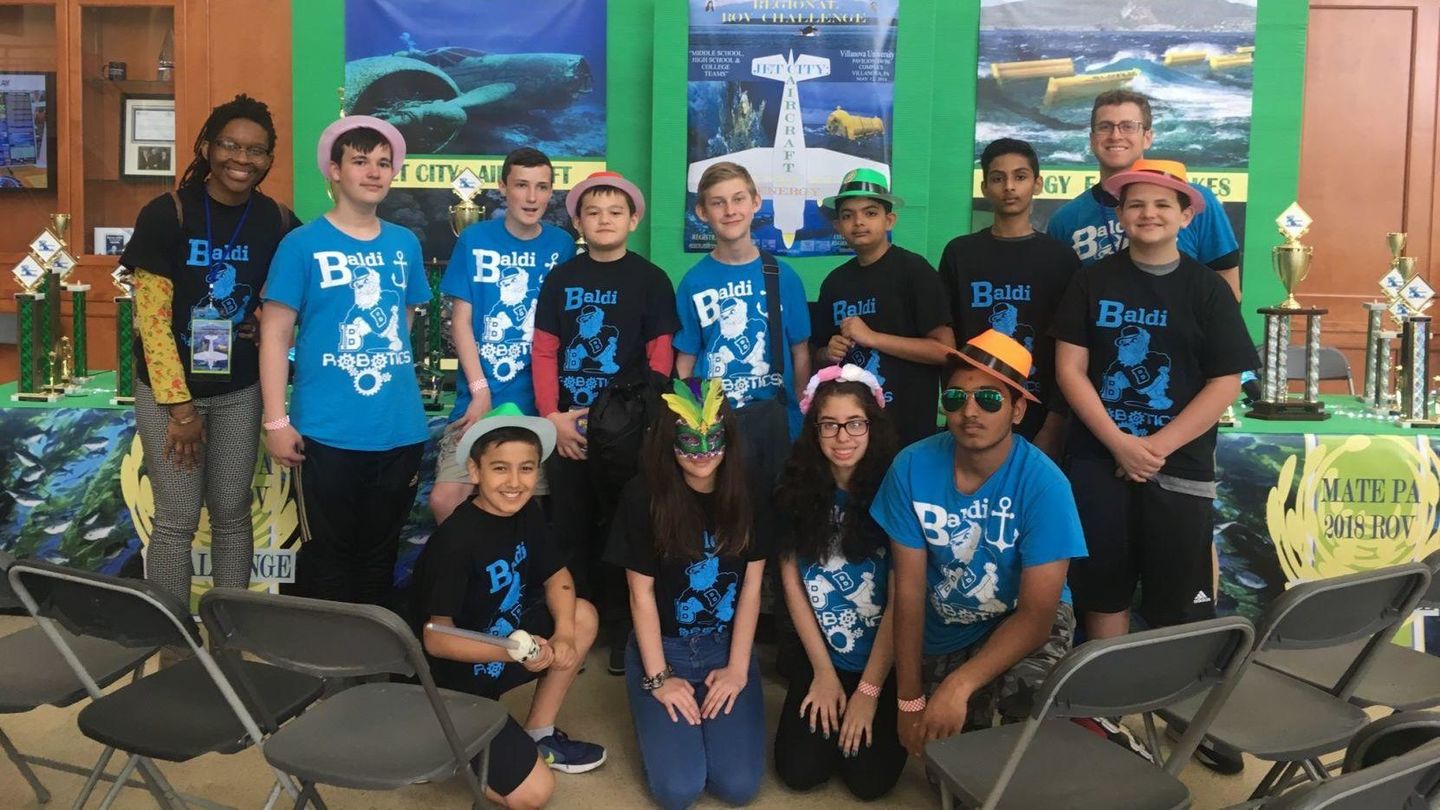 Seventh-grade science teacher at C.C.A. Baldi Middle School, Laura Hassan, far left, with students C.C.A. Baldi Middle school teacher, Lauren Hassan with students