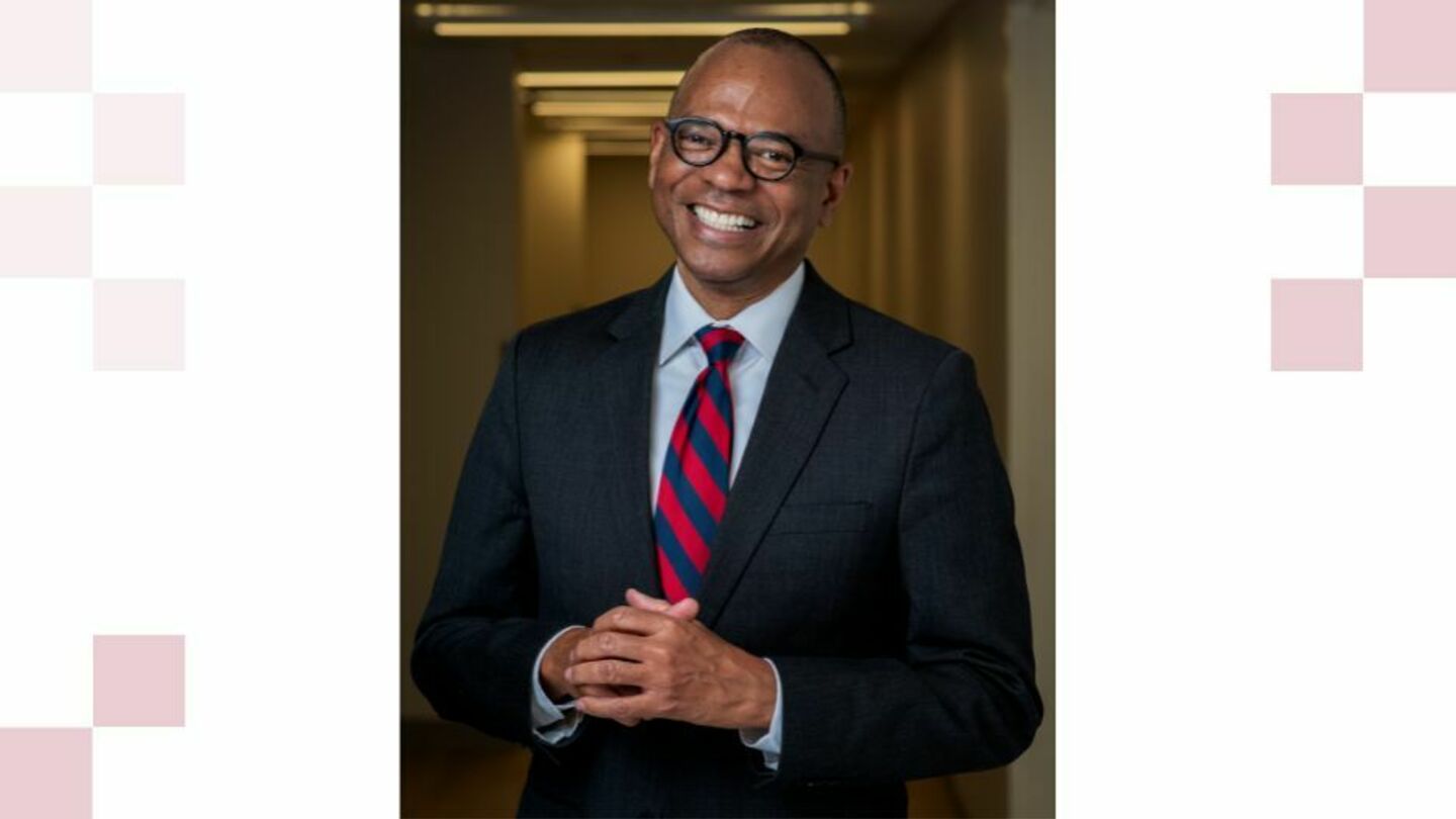 James Earl Davis poses in a hallway