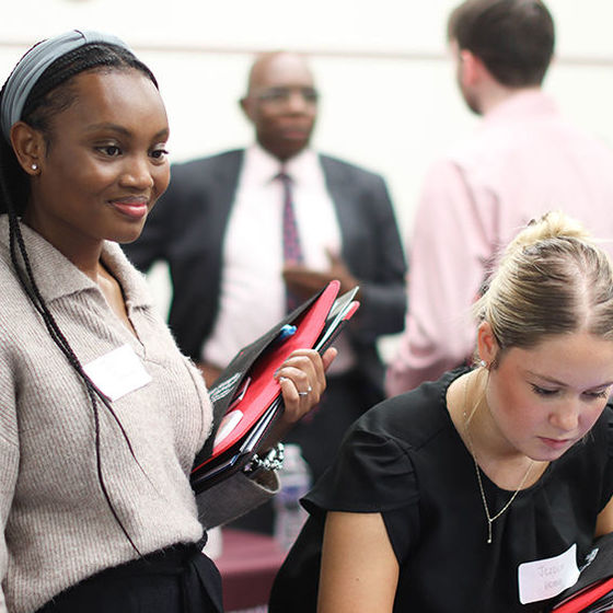 Students engage with employeers at career fair